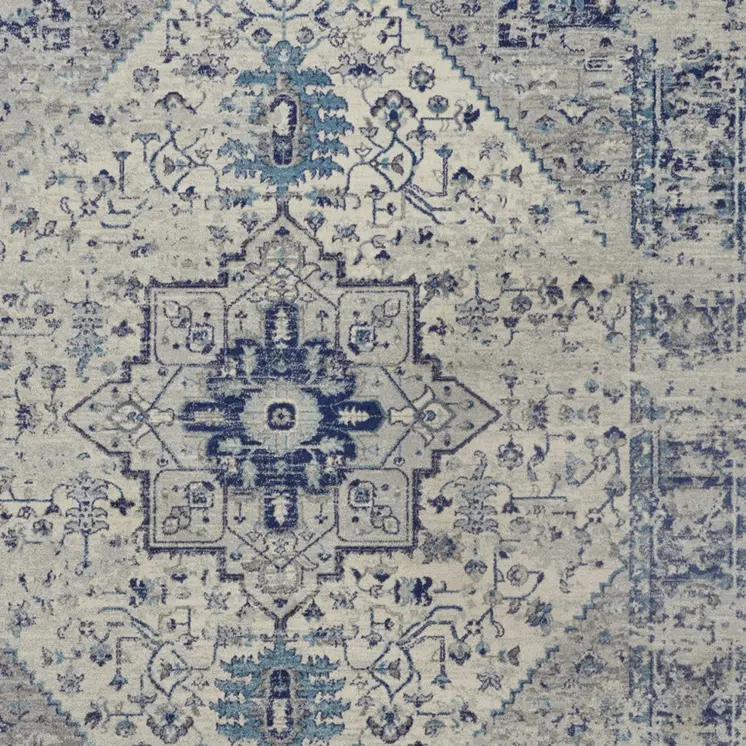 9' X 12' Ivory And Light Blue Floral Medallion Distressed Area Rug