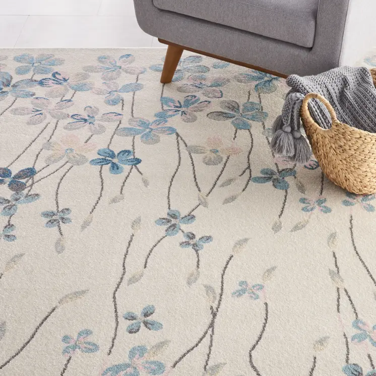 9' X 12' Ivory And Blue Floral Area Rug
