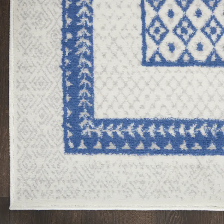 8' X 12' Ivory and Blue Geometric Distressed Non Skid Area Rug