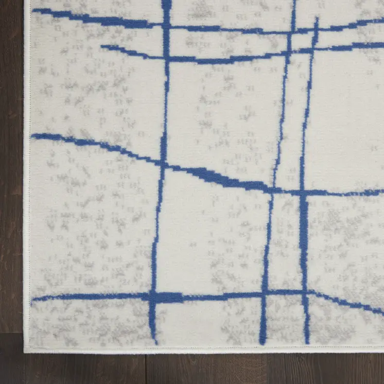 8' X 12' Ivory and Blue Abstract Geometric Distressed Non Skid Area Rug