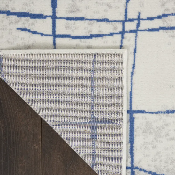 8' X 12' Ivory and Blue Abstract Geometric Distressed Non Skid Area Rug