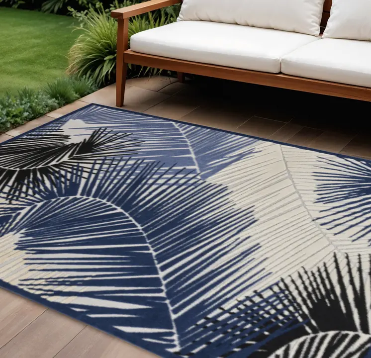 10' X 13' Navy Blue Black And Ivory Palm Leaf Indoor Outdoor Area Rug