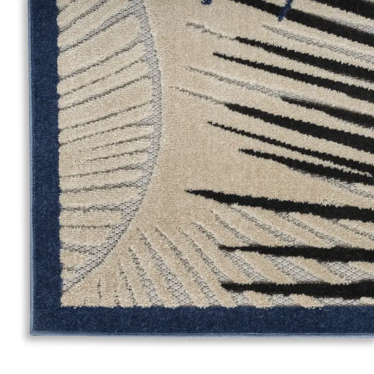 10' X 13' Navy Blue Black And Ivory Palm Leaf Indoor Outdoor Area Rug