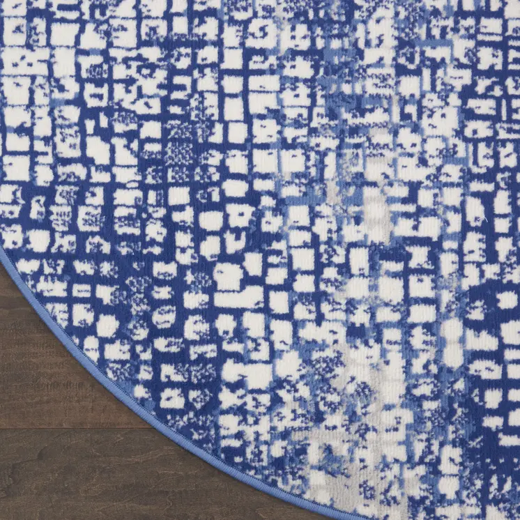 8' Ivory and Navy Blue Abstract Round Rug