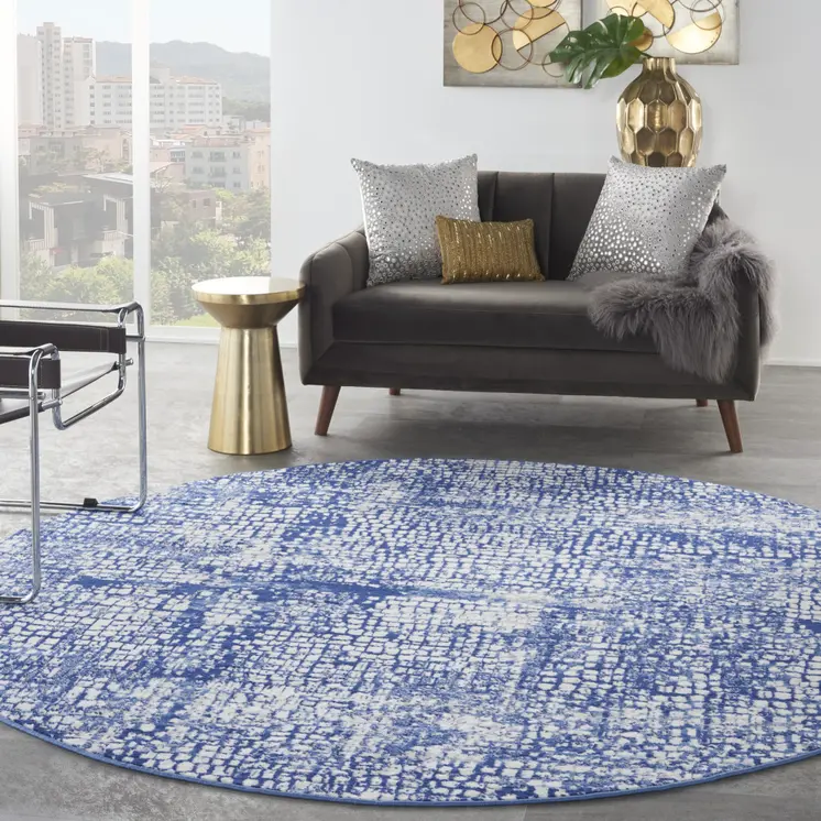 8' Ivory and Navy Blue Abstract Round Rug