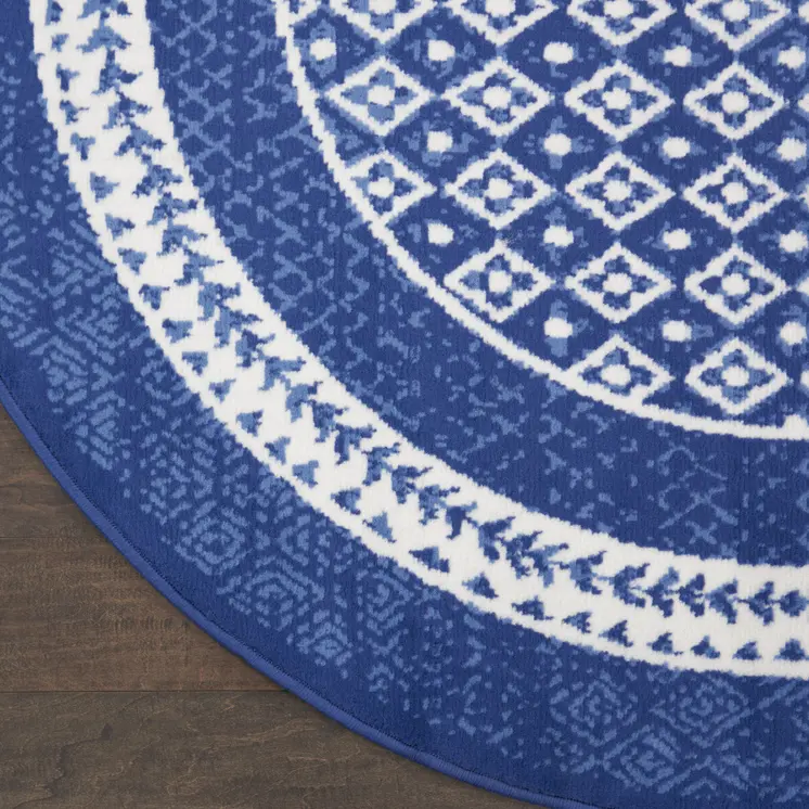 8' Ivory and Navy Blue Geometric Distressed Round Rug