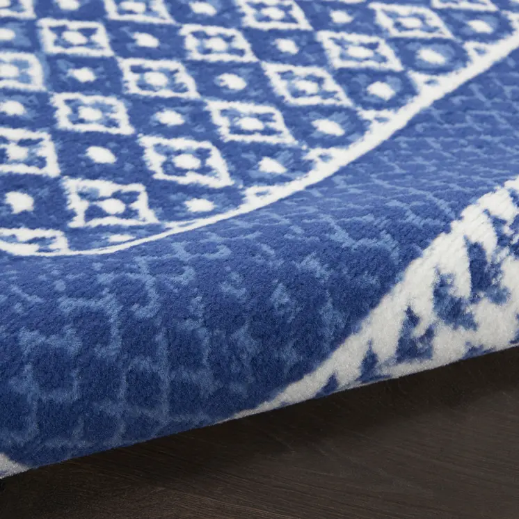 8' Ivory and Navy Blue Geometric Distressed Round Rug