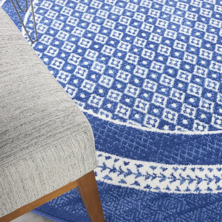 8' Ivory and Navy Blue Geometric Distressed Round Rug