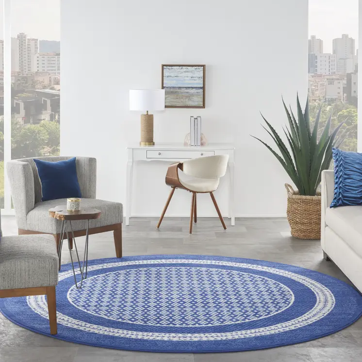8' Ivory and Navy Blue Geometric Distressed Round Rug