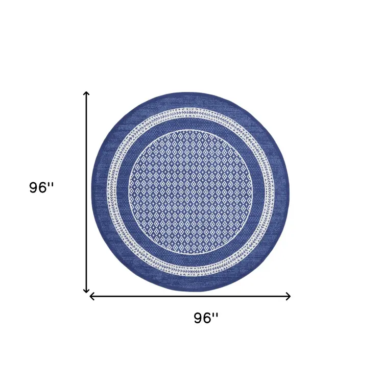 8' Ivory and Navy Blue Geometric Distressed Round Rug