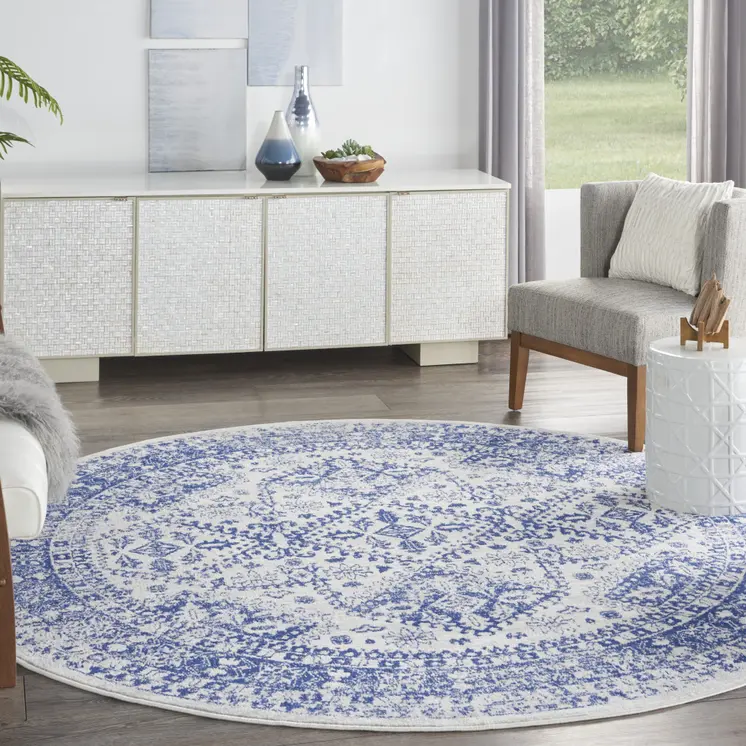 8' Ivory and Navy Blue Geometric Distressed Round Rug