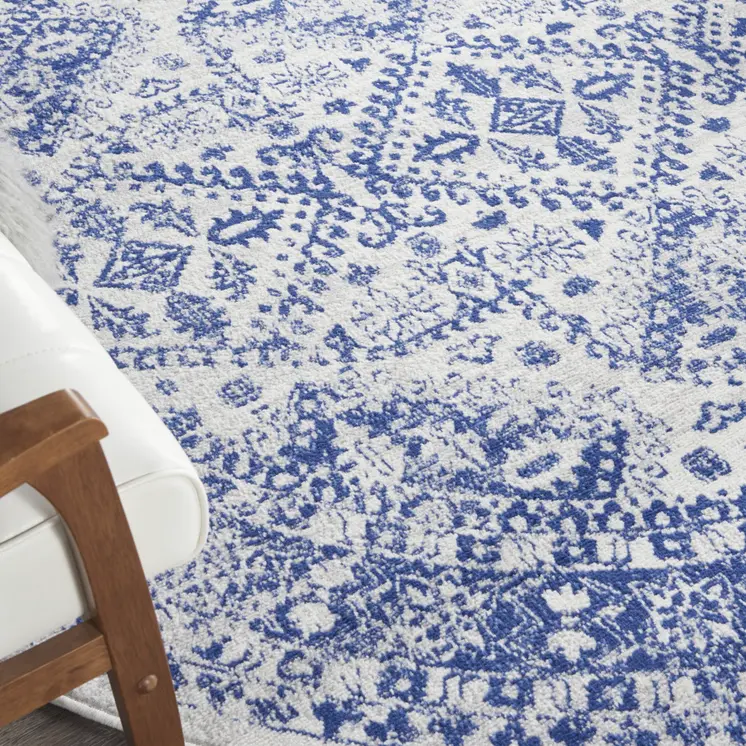 8' Ivory and Navy Blue Geometric Distressed Round Rug