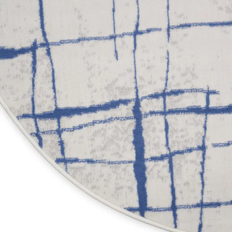5' Ivory and Blue Abstract Geometric Distressed Round Rug