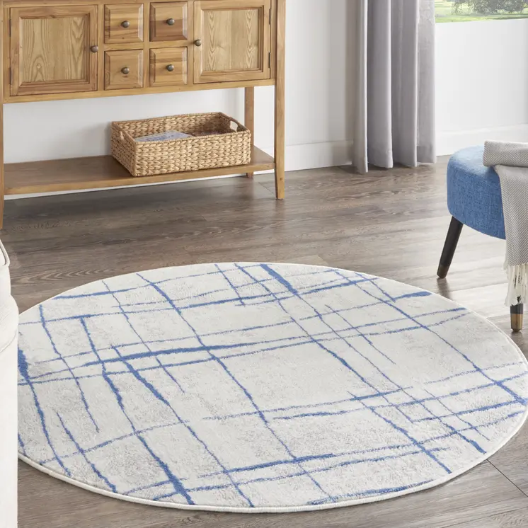 5' Ivory and Blue Abstract Geometric Distressed Round Rug