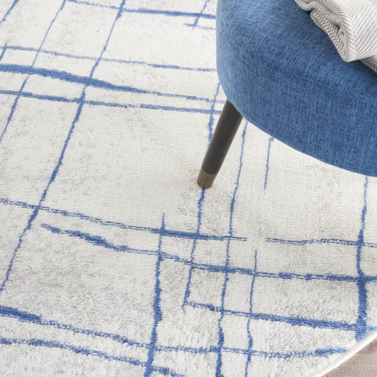 5' Ivory and Blue Abstract Geometric Distressed Round Rug