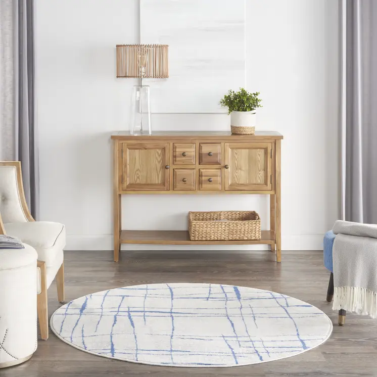 5' Ivory and Blue Abstract Geometric Distressed Round Rug
