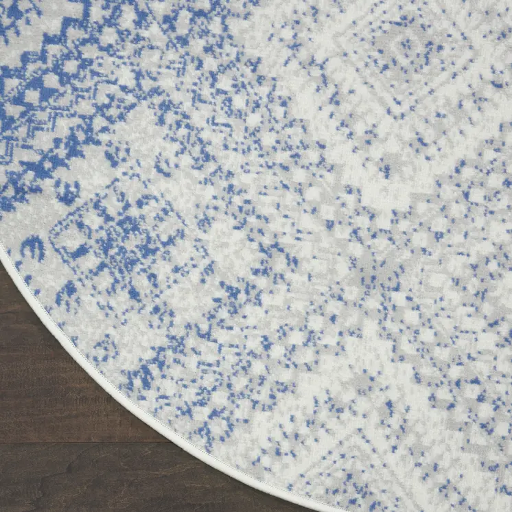 5' Ivory and Blue Geometric Distressed Round Rug