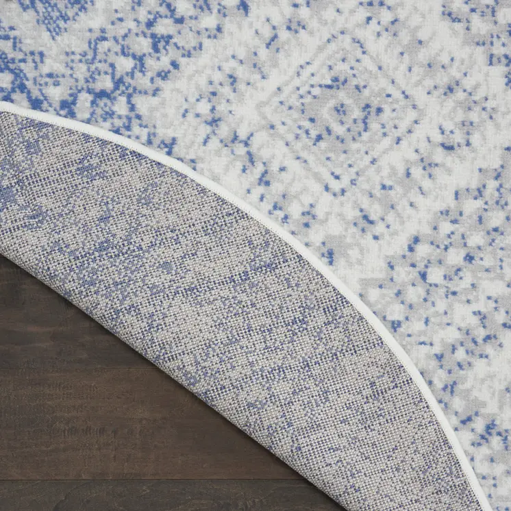 5' Ivory and Blue Geometric Distressed Round Rug
