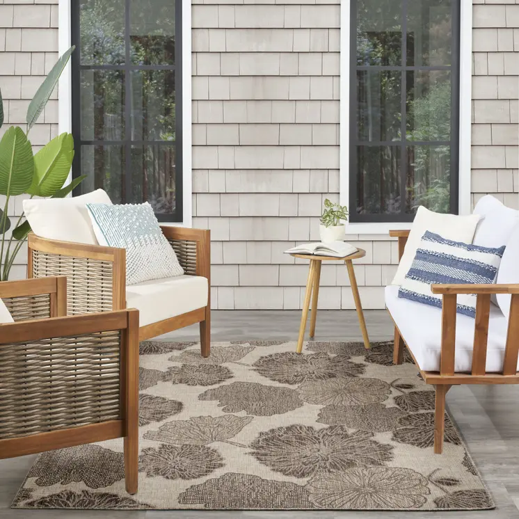 5' X 7' Natural And Ivory Floral Indoor Outdoor Area Rug