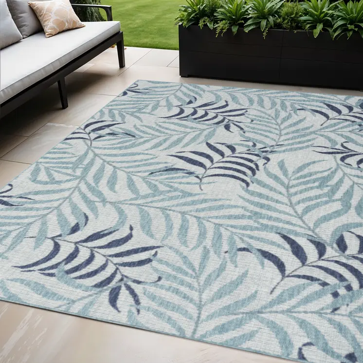 5' X 7' Navy Blue Ivory And Blue Palm Leaf Indoor Outdoor Area Rug