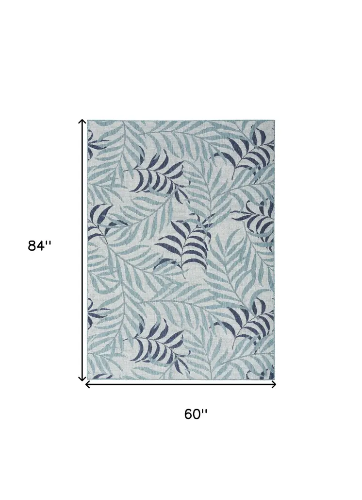 5' X 7' Navy Blue Ivory And Blue Palm Leaf Indoor Outdoor Area Rug