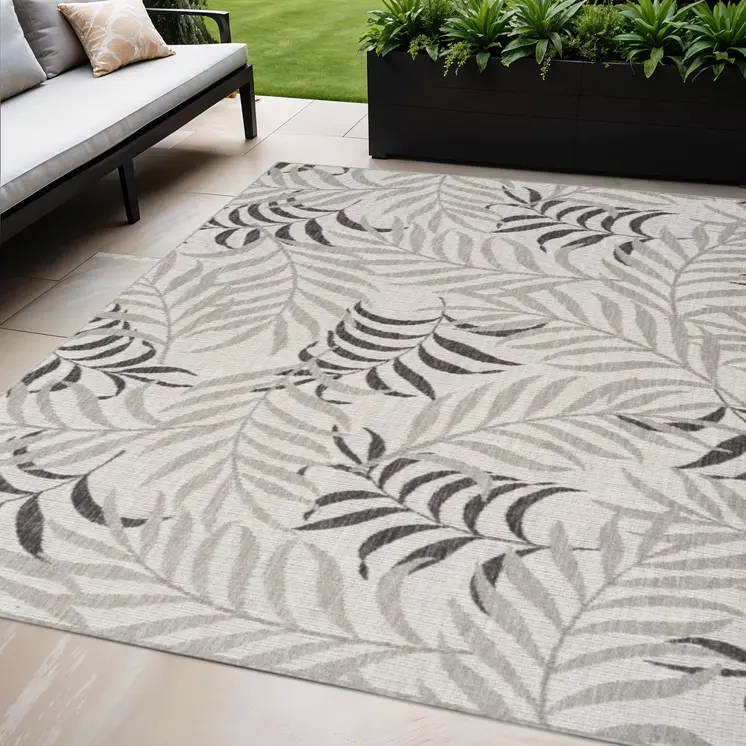 5' X 7' Gray Black And Ivory Palm Leaf Indoor Outdoor Area Rug