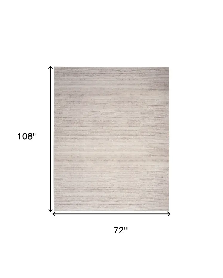 6' X 9' Ivory and Light Brown Abstract Washable Area Rug