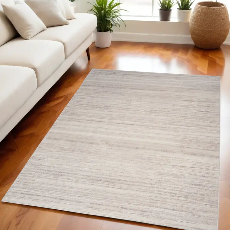 5' X 7' Ivory and Light Brown Abstract Washable Area Rug