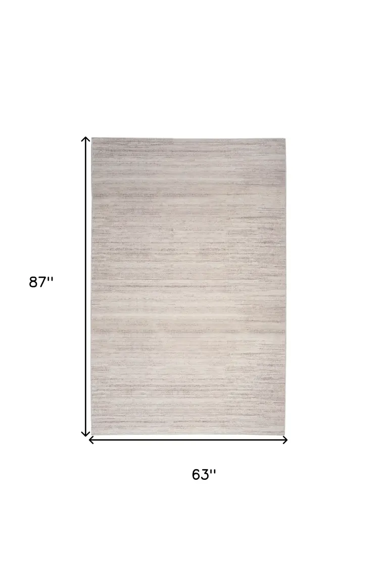 5' X 7' Ivory and Light Brown Abstract Washable Area Rug