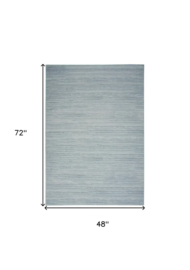 4' X 6' Aqua Abstract Washable Area Rug