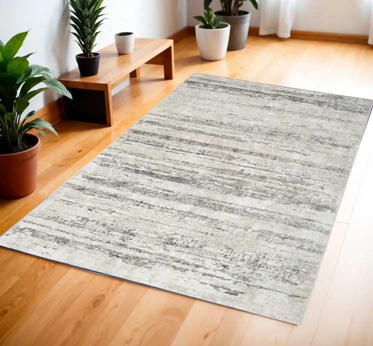 4' X 6' Cream and Gray Abstract Non Skid Area Rug