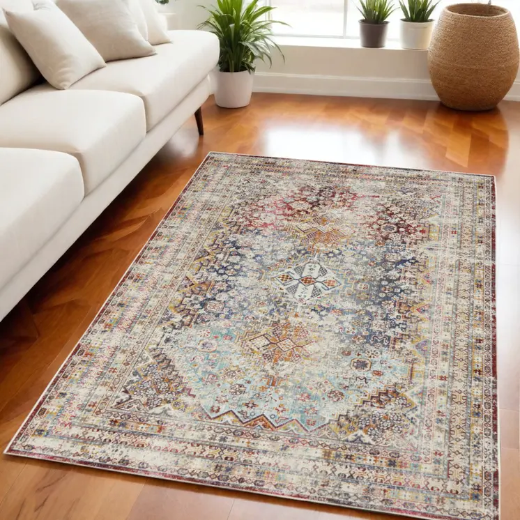 5' X 8' Ivory Red And Orange Geometric Distressed Area Rug