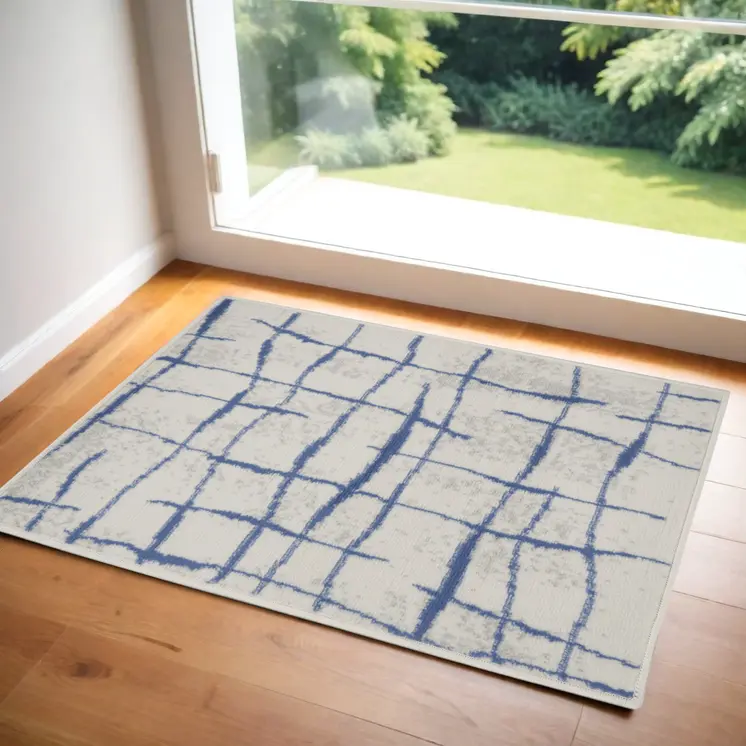 3' X 5' Ivory and Blue Abstract Geometric Distressed Area Rug