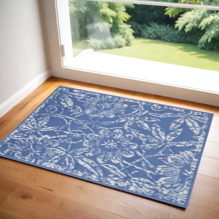 3' X 5' Ivory and Blue Floral Distressed Area Rug