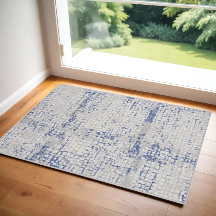 3' X 5' Ivory Blue and Gray Abstract Area Rug
