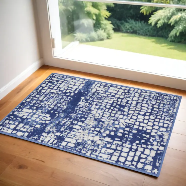 3' X 5' Ivory and Navy Blue Abstract Area Rug
