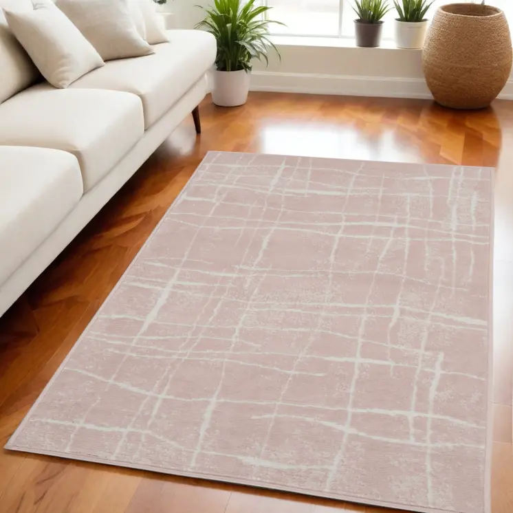 5' X 7' Pink and Ivory Abstract Geometric Area Rug