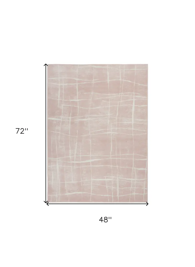 4' X 6' Pink and Ivory Abstract Geometric Area Rug
