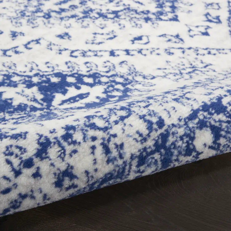 6' Ivory and Navy Blue Geometric Distressed Runner Rug