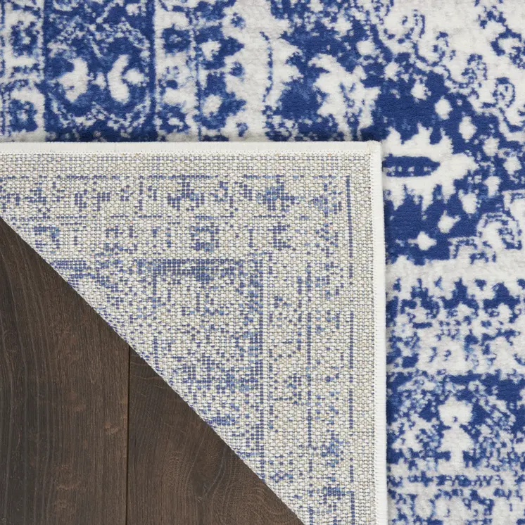6' Ivory and Navy Blue Geometric Distressed Runner Rug