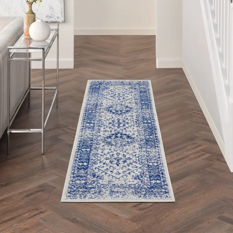 6' Ivory and Navy Blue Geometric Distressed Runner Rug
