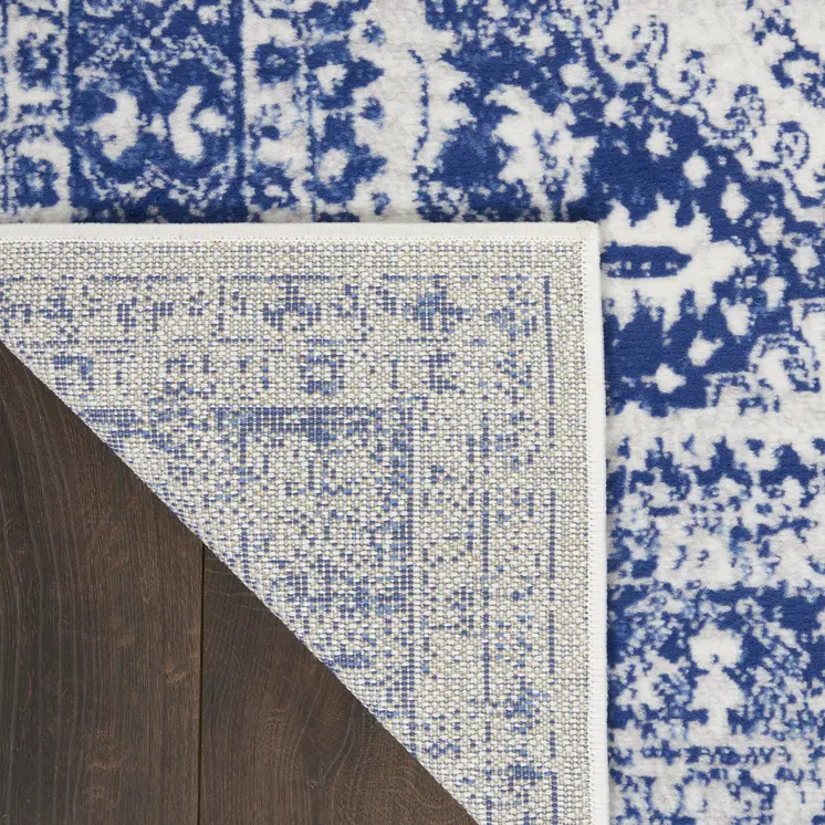 6' Ivory and Navy Blue Geometric Distressed Runner Rug
