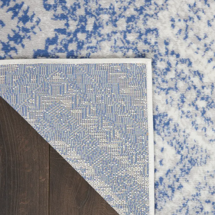 3' X 5' Blue and Ivory Geometric Distressed Area Rug