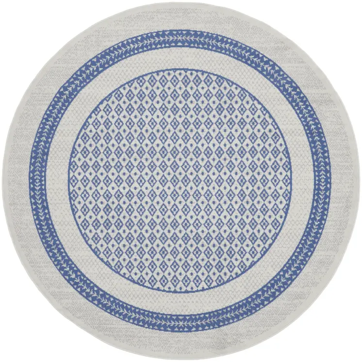 8' Ivory and Blue Geometric Distressed Round Rug