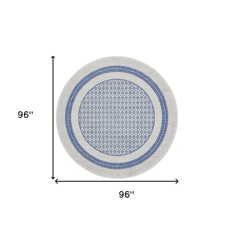 8' Ivory and Blue Geometric Distressed Round Rug
