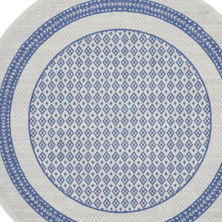 8' Ivory and Blue Geometric Distressed Round Rug
