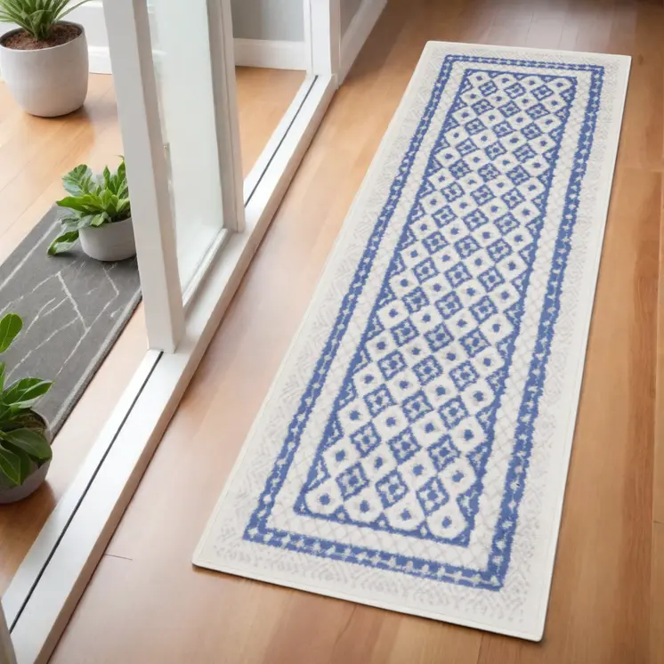 6' Ivory and Blue Geometric Distressed Runner Rug