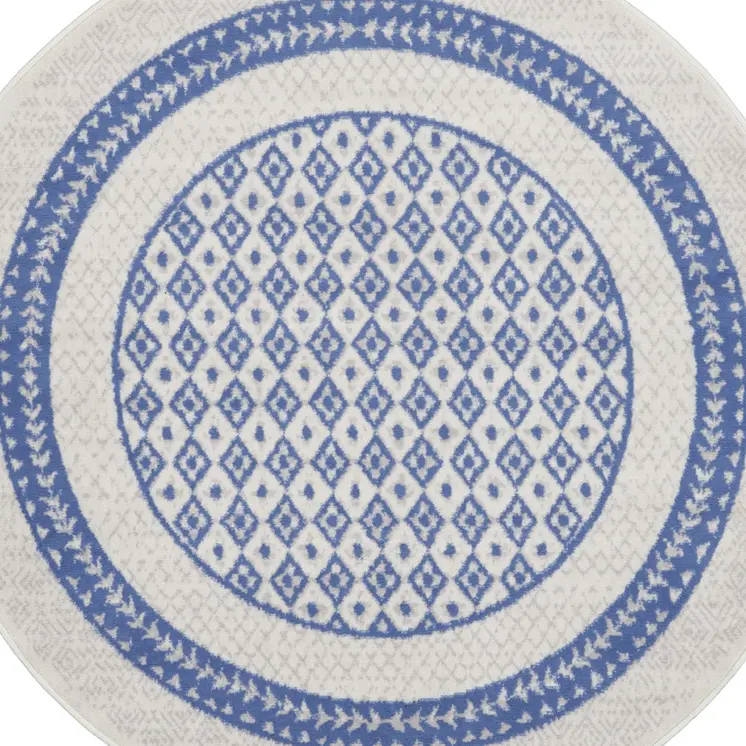 5' Ivory and Blue Geometric Distressed Round Rug
