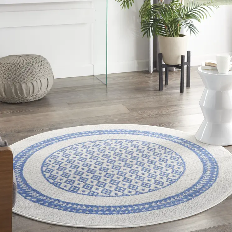 5' Ivory and Blue Geometric Distressed Round Rug