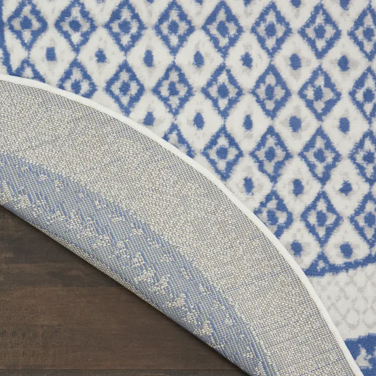 5' Ivory and Blue Geometric Distressed Round Rug